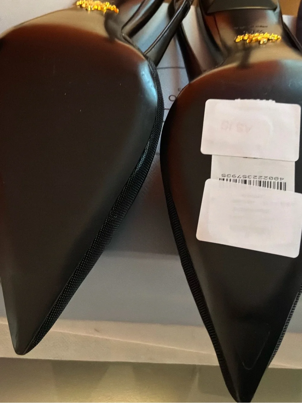 Prada Black Pointed Slingback Pumps with Logo Plaque
